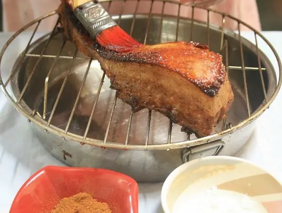phủ giấm lên da heo