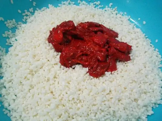 trộn gạo với hạt gấc