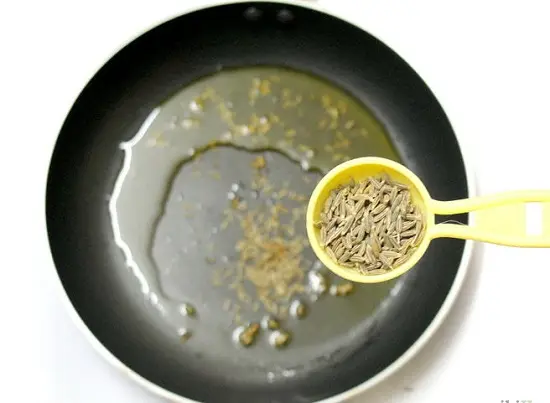 đun nóng hạt thì là